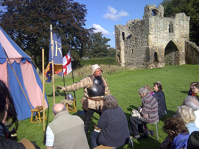 Re-enactor at Etal Castle telling the Society about the battle of Flodden